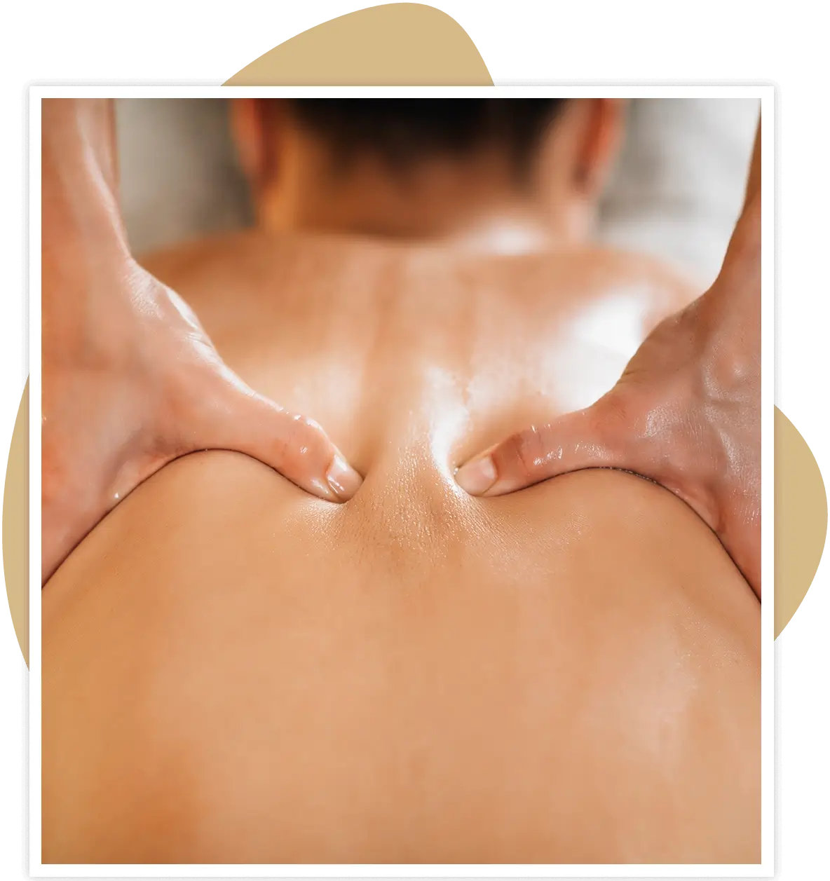 Person receiving a back massage with hands applying pressure.